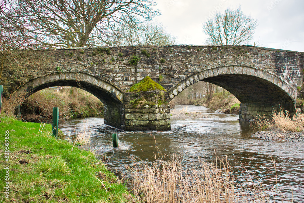 Fototapeta premium A bridge crossing the River Aeron