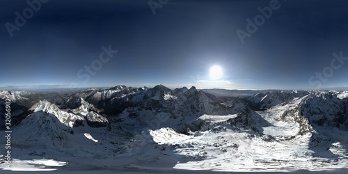 Rysy (2499m), Poland panorama 360 degrees- Sun in the winter mountains