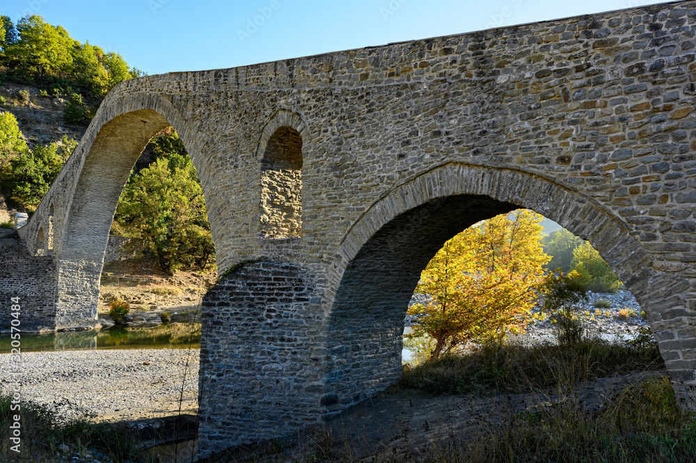View of the traditional stone bridge of Aziz Aga near Grevena in northwestern Greece