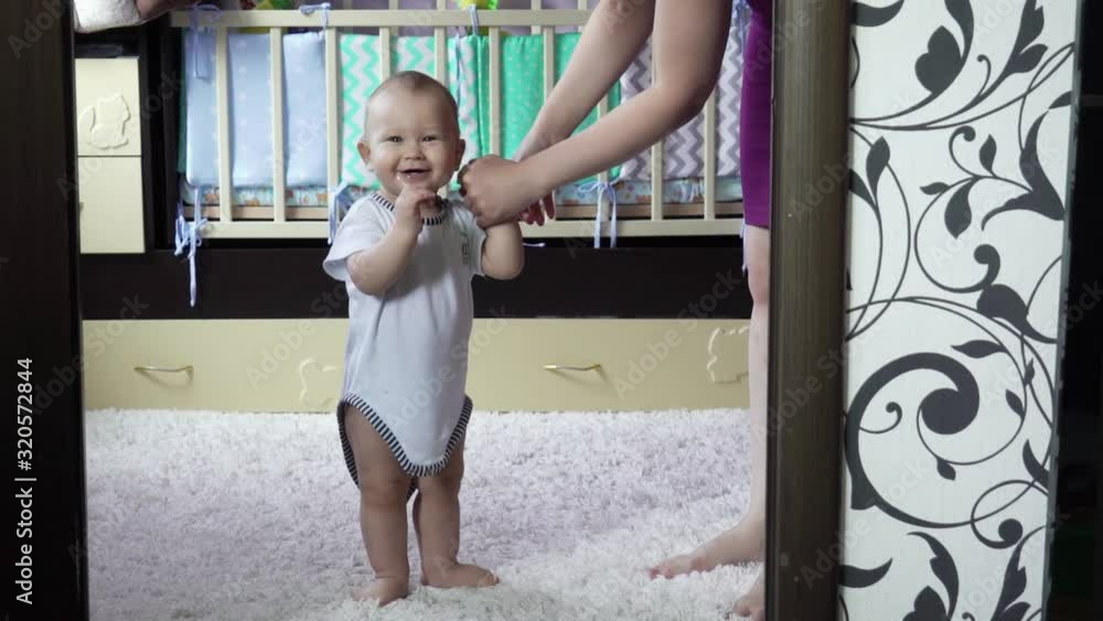 The first steps of a charming baby. The first steps of a charming baby.