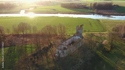 Ruins of the Lutheran Church in Salgale Latvia Near of the Bank of the River Lielupe Aerial View photo