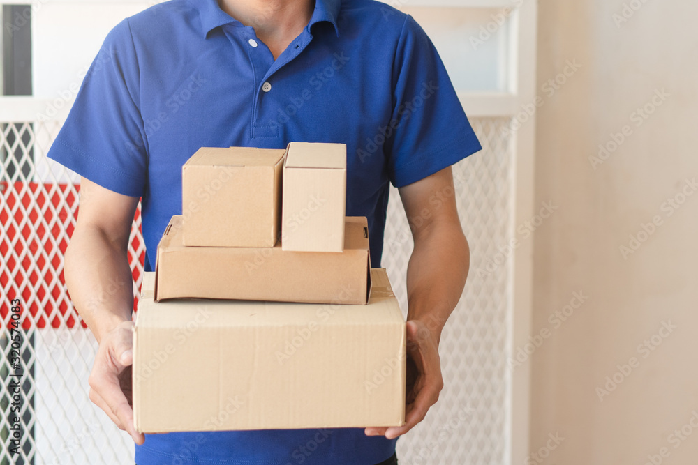Delivery Man sending package to receiver on doorway. cover size with copy space. Delivery Man sending package to receiver on doorway. cover size with copy space.