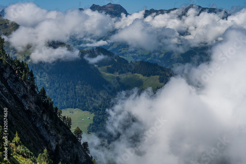 Beautiful swiss alps mountains. Clouds 