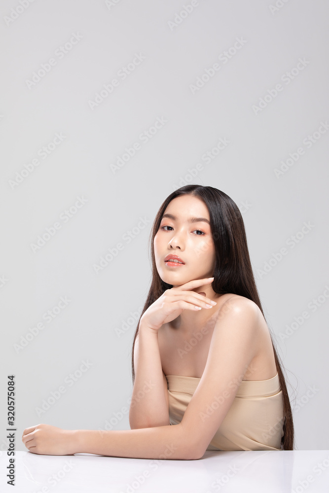 Beautiful Asian young woman touching soft cheek smile with clean and fresh skin Happiness and cheerful with positive emotional,isolated on white background,Beauty and Cosmetics Concept Beautiful Asian young woman touching soft cheek smile with clean and fresh skin Happiness and cheerful with positive emotional,isolated on white background,Beauty and Cosmetics Concept