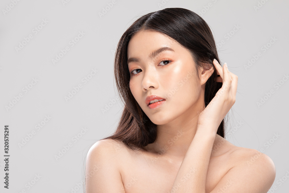 Beautiful Asian woman touching soft cheek smile with clean and fresh skin Happiness and cheerful with positive emotional,isolated on white background,Beauty and Cosmetics Concept Beautiful Asian woman touching soft cheek smile with clean and fresh skin Happiness and cheerful with positive emotional,isolated on white background,Beauty and Cosmetics Concept