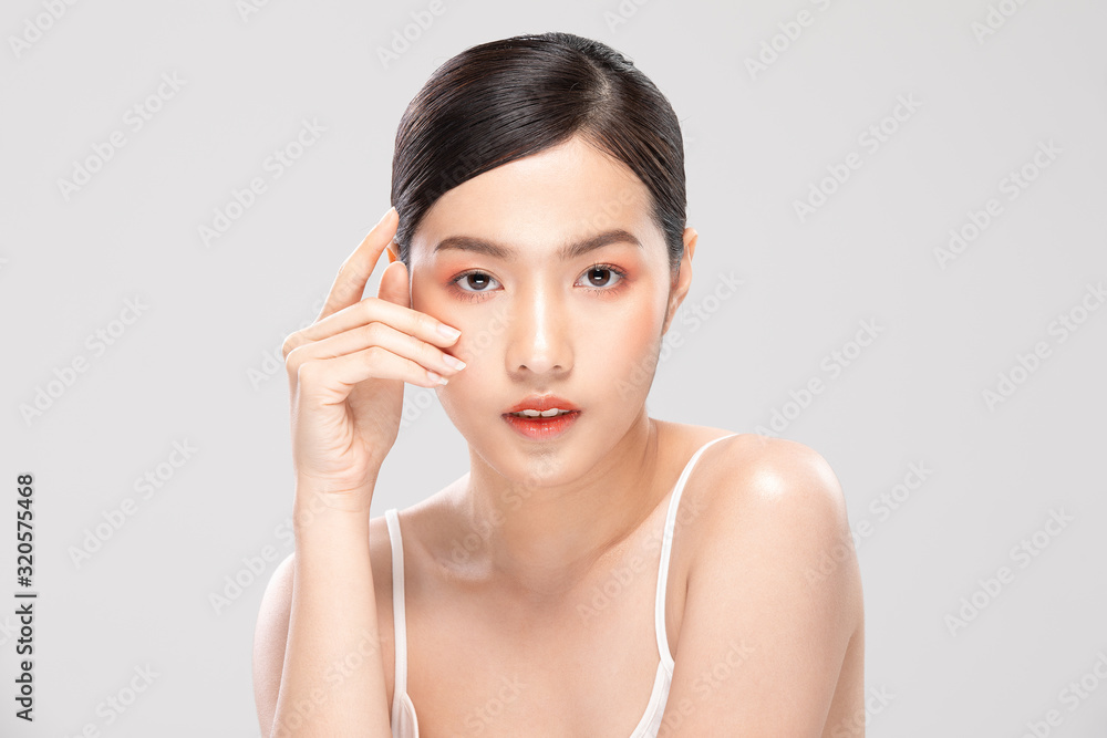 Beautiful Asian young woman touching soft cheek smile with clean and fresh skin Happiness and cheerful with positive emotional,isolated on white background,Beauty and Cosmetics Concept Beautiful Asian young woman touching soft cheek smile with clean and fresh skin Happiness and cheerful with positive emotional,isolated on white background,Beauty and Cosmetics Concept