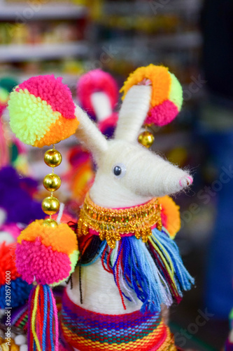 Cute and colorful stuffed alpaca or llama animal for children