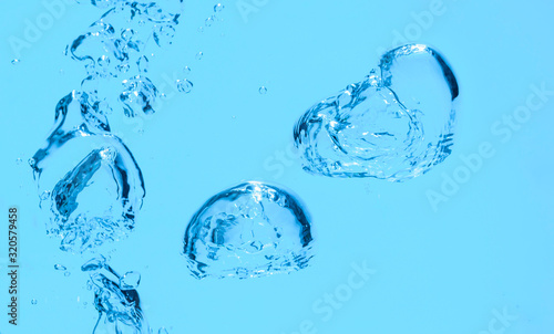 Blue water bubble background. Underwater splash in clear liquid.