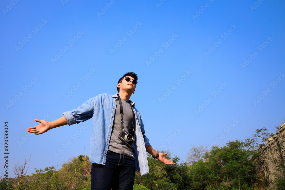 men holding arms in the nature background freedom men concept