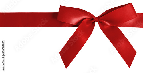 Red Ribbon Tied into Bow Isolated on White Background