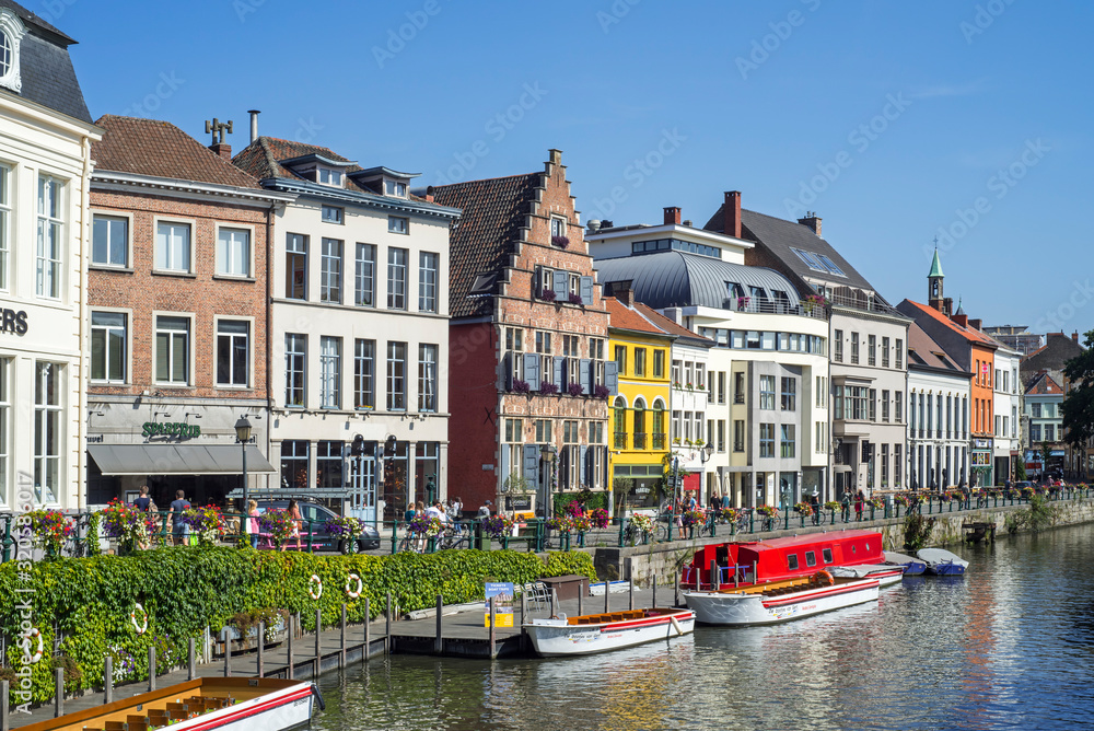 Restaurants and sightseeing boats along the Kraanlei / Crane Lane in the city Ghent / Gent, East Flanders, Belgium