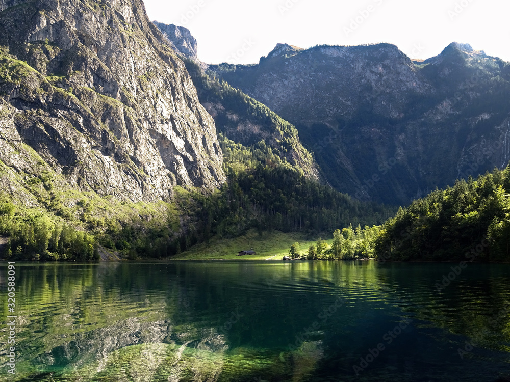 Lake Obersee with mountains of german alps in the background in scenic National park Berchtesgaden Bavaria, Germany