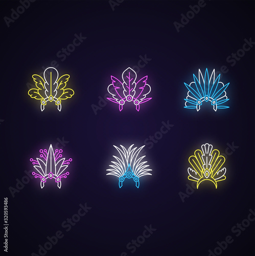 Brazilian carnival hat neon light icons set. Crown with plumage. Traditional headwear. Ethnic festival. Masquerade parade. Signs with outer glowing effect. Vector isolated RGB color illustrations