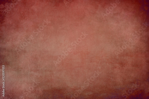 Red canvas grungy backdrop or texture
