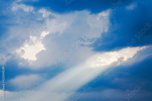 Beautiful blue sky with bright sun ray. Hope, prayer, God's mercy and grace © oksix