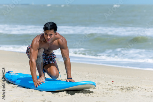 Photography Surf man on surfboard