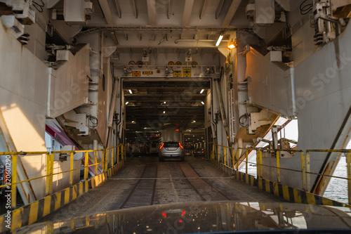 Driving inside a big car ferry in the port of Turku Finland in the evening