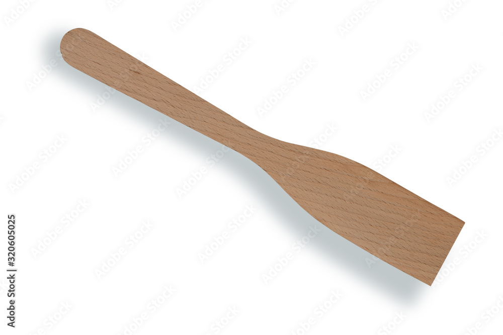 Wooden spatula for turning and frying food. Isolated on a white background with shadow Wooden spatula for turning and frying food. Isolated on a white background with shadow