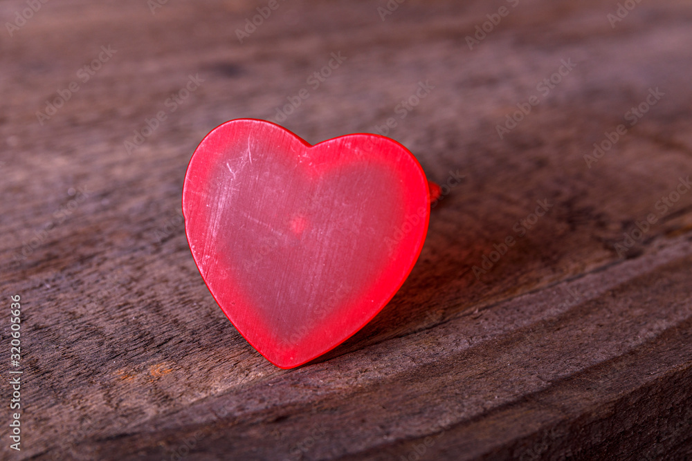 Love hearts on wooden texture background, valentines day card concept Love hearts on wooden texture background, valentines day card concept