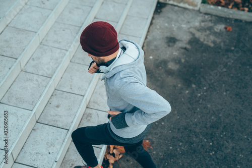 high angel view of young man jogging on stairs outdoor