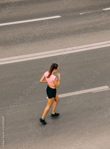 Woman Training On Street © Kuzmaphoto