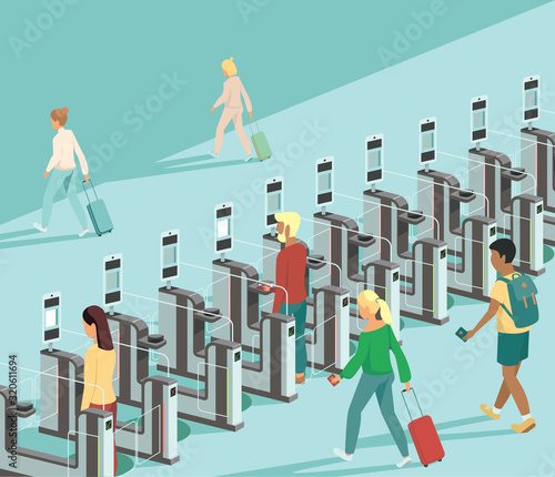 Air travellers pass through automated passport border control gates