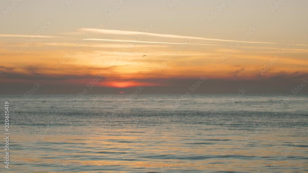 Best beautiful sunset or sunrise on paradise sand beach on the island in slow motion Best beautiful sunset or sunrise on paradise sand beach on the island in slow motion