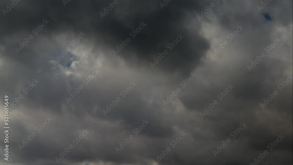 Bad weather is approaching with black clouds. Storm and hurricane with strong wind. Bad weather is approaching with black clouds. Storm and hurricane with strong wind.