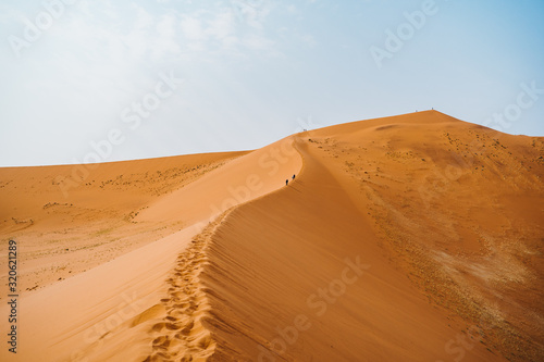 Walking on the sand dunes, Namibia, Africa