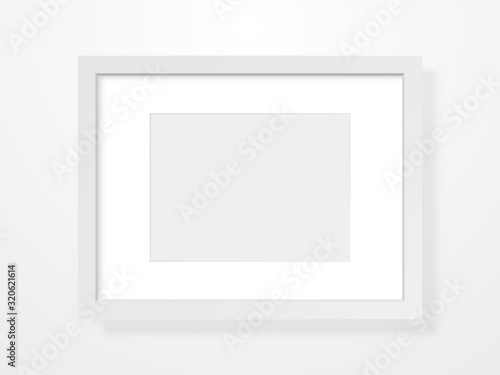 Realistic frame on light background. Empty picture template. Clean rectangle mockup on a wall. Photo blank with white border. Room interior object. Vector illustration
