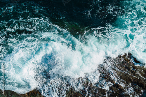 Sea ​​waves breaking against the rocks