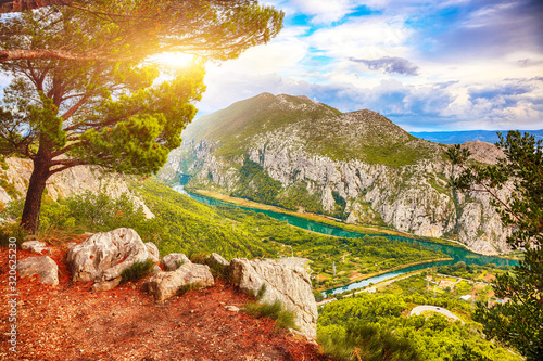Fototapeta Naklejka Na Ścianę i Meble -  Beautiful aerial panoramic view of Cetina river canyon and mouth in Omi