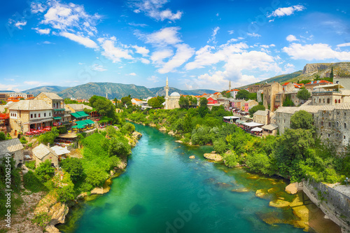 Nerteva River and Old City of Mostar, with Ottoman Mosque during sunny day