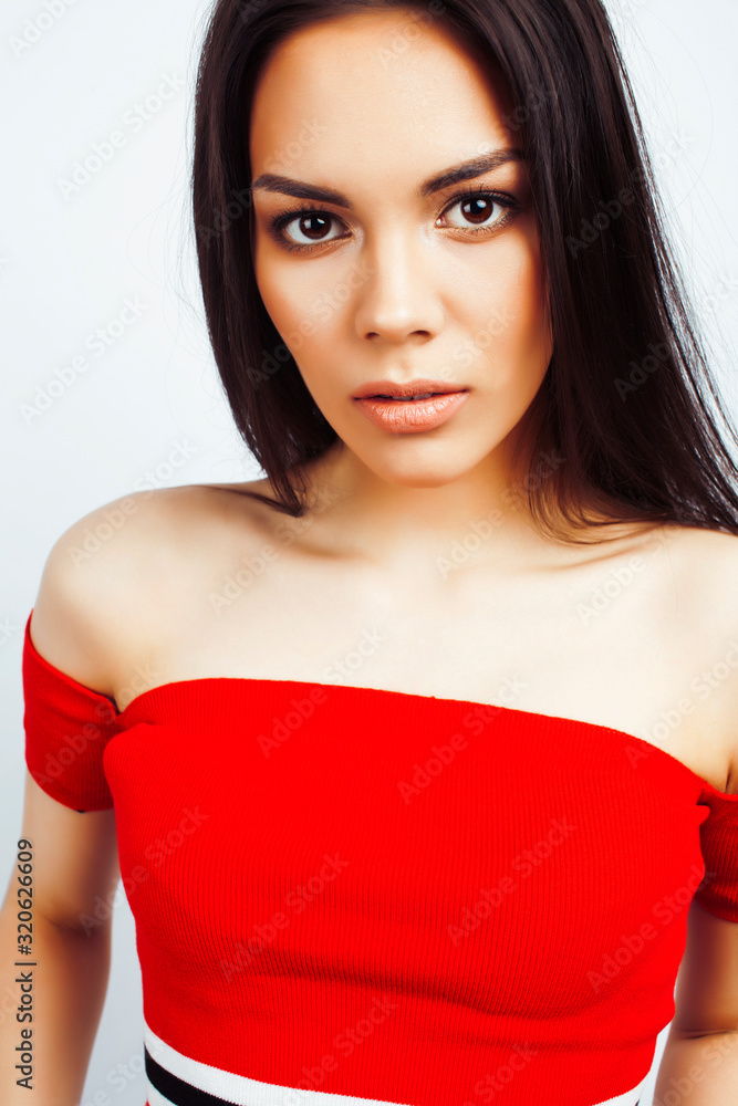 Fototapeta premium young happy smiling latin american teenage girl emotional posing on white background, lifestyle people concept