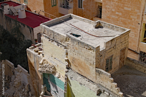 Aerial view of a demolished building prior to its redevelopment as new apartments