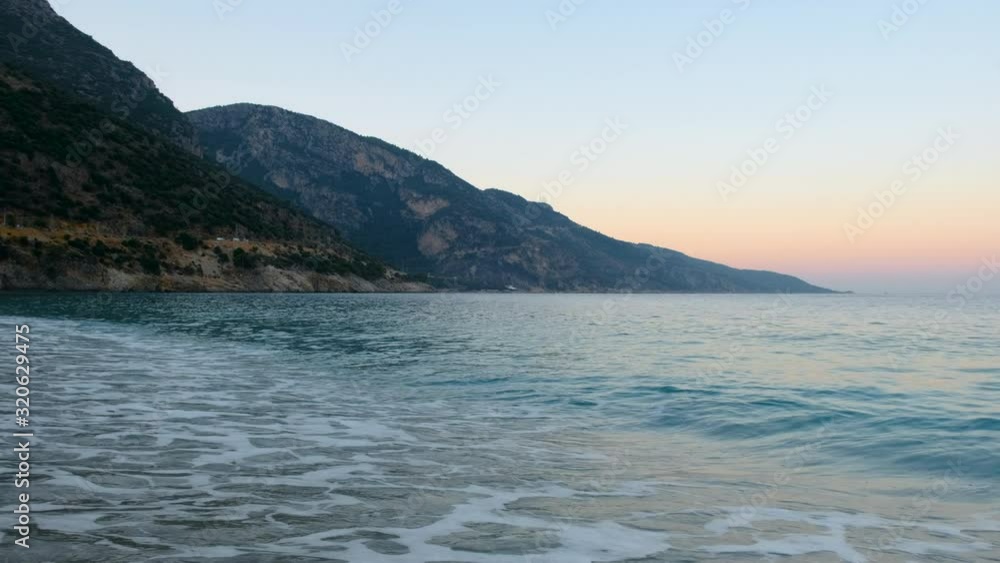 Oludeniz, Turkey. Waves on the Mediterranean Sea at Sunrise Oludeniz, Turkey. Waves on the Mediterranean Sea at Sunrise