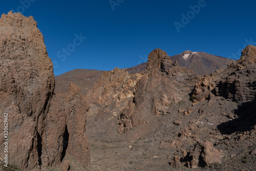  View of Roques de García unique rock formation with famous Pico del Teide mountain volcano summit in the background on a sunrise, Teide National Park, Tenerife, Canary Islands, Spain