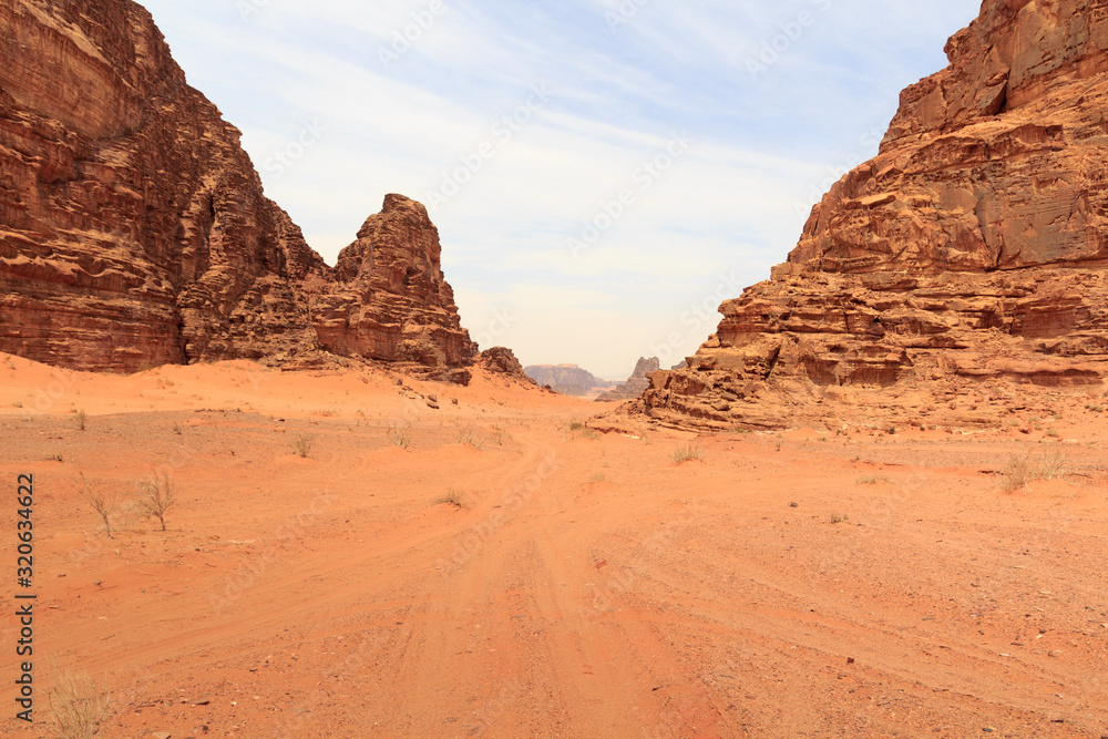 Wadi Rum desert panorama with dunes, mountains and sand that looks like planet Mars surface, Jordan