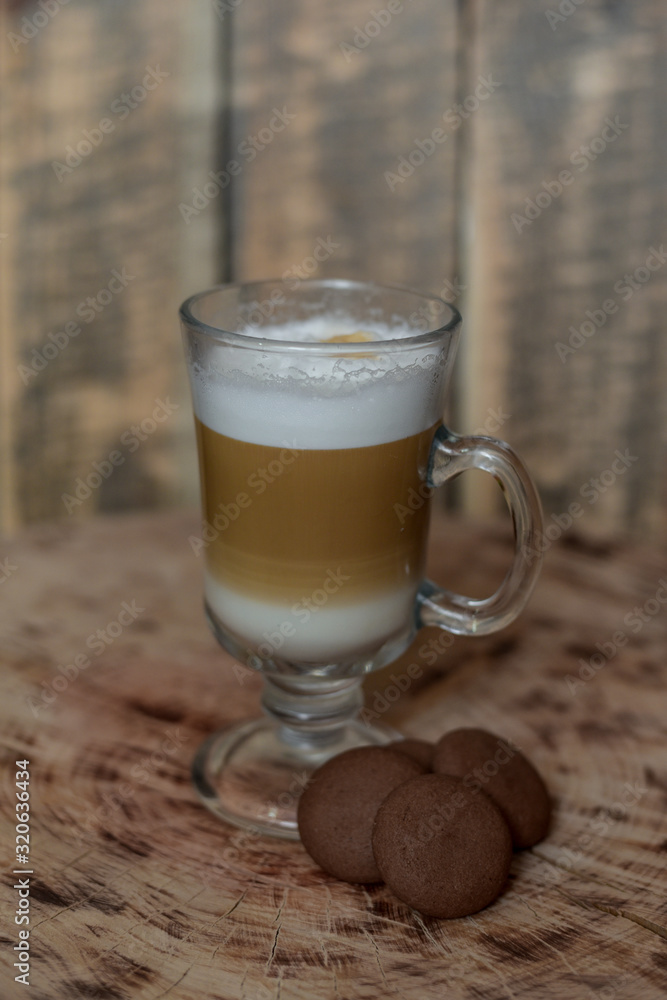 Latte coffee in a glass. Cappuccino. Latte. Coffee with milk. Coffee with milk foam Latte coffee in a glass. Cappuccino. Latte. Coffee with milk. Coffee with milk foam