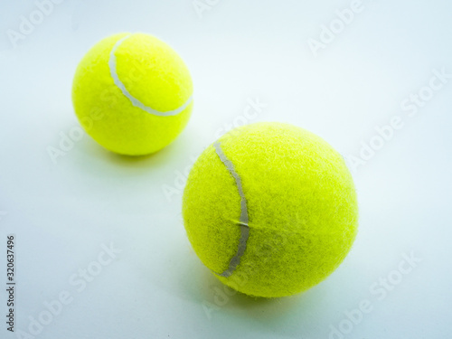 two tennis ball on white background © Valeria
