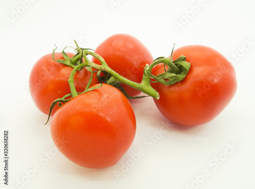 fresh tomatoes isolated on white background