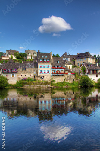 The Dordogne River Floating through Beautiful Argentat, France © Rolf