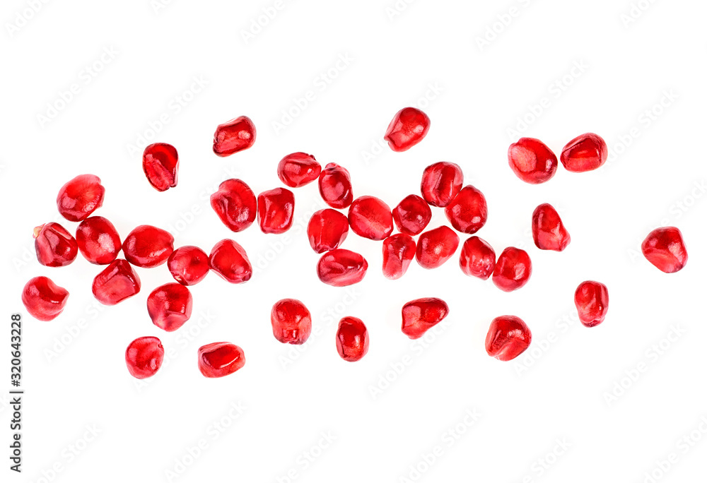 Garnet grains isolated on a white background, top view. Garnet grains isolated on a white background, top view.
