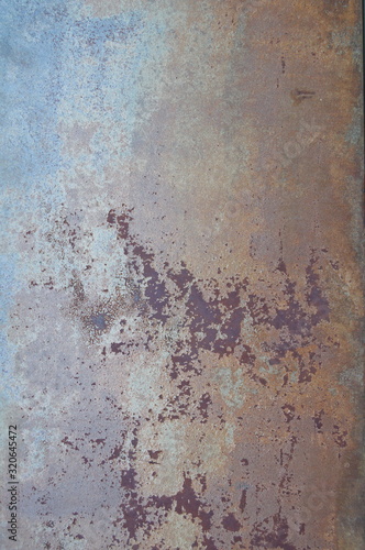 Rusty brown metal background pattern © Artem