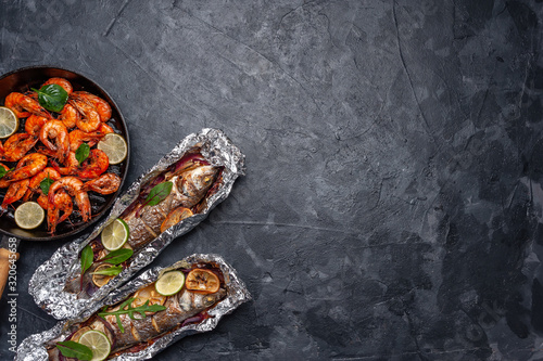 Fried seabass fishes and shrimps