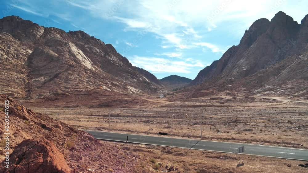 Mountains and road near Saint Catherines Monastery in Sinai peninsula, Egypt Mountains and road near Saint Catherines Monastery in Sinai peninsula, Egypt