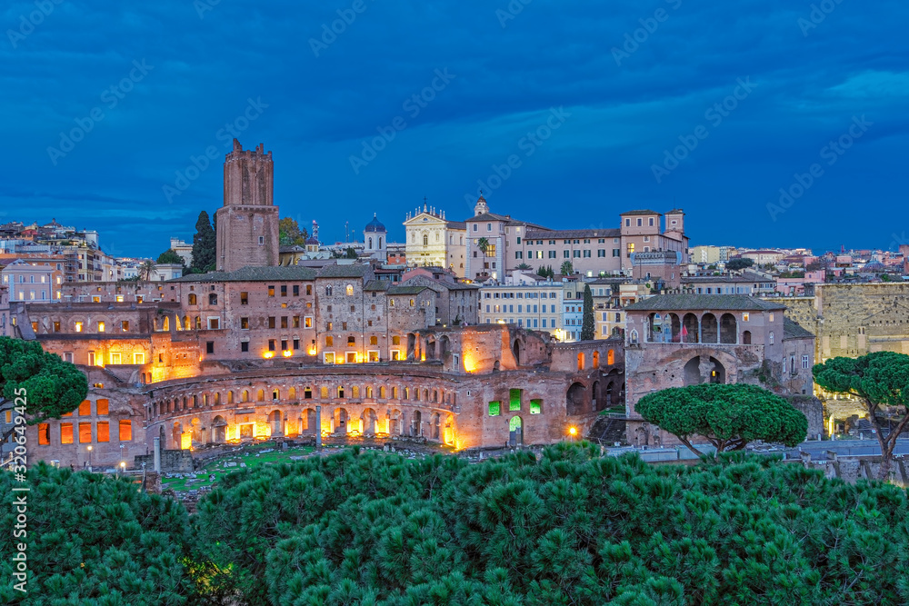 Trajans Market (Mercati di Traiano) and Casa dei Cavalieri di Rodi (House of the Knights of Rhodes) at blue hour, elevated view, Rome, Lazio Trajans Market (Mercati di Traiano) and Casa dei Cavalieri di Rodi (House of the Knights of Rhodes) at blue hour, elevated view, Rome, Lazio