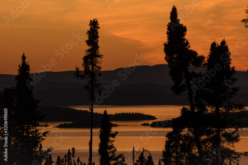 landscape of a sunset. Lake Manicouagan in Quebec. Mountain landscape with lake