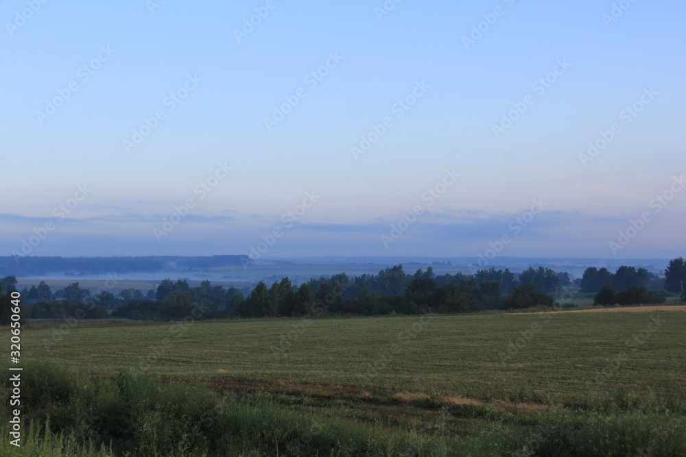 August and fields in Russian provinces