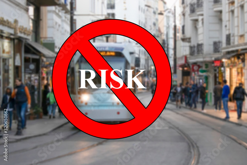 Istanbul, Turkey - February-02.020:The word do not go out has a red color and is framed. An underground underpass in the background. People are outside.